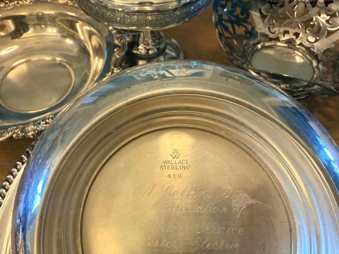 Wallace Sterling 410 mark stamped on the underside of a vintage silver piece