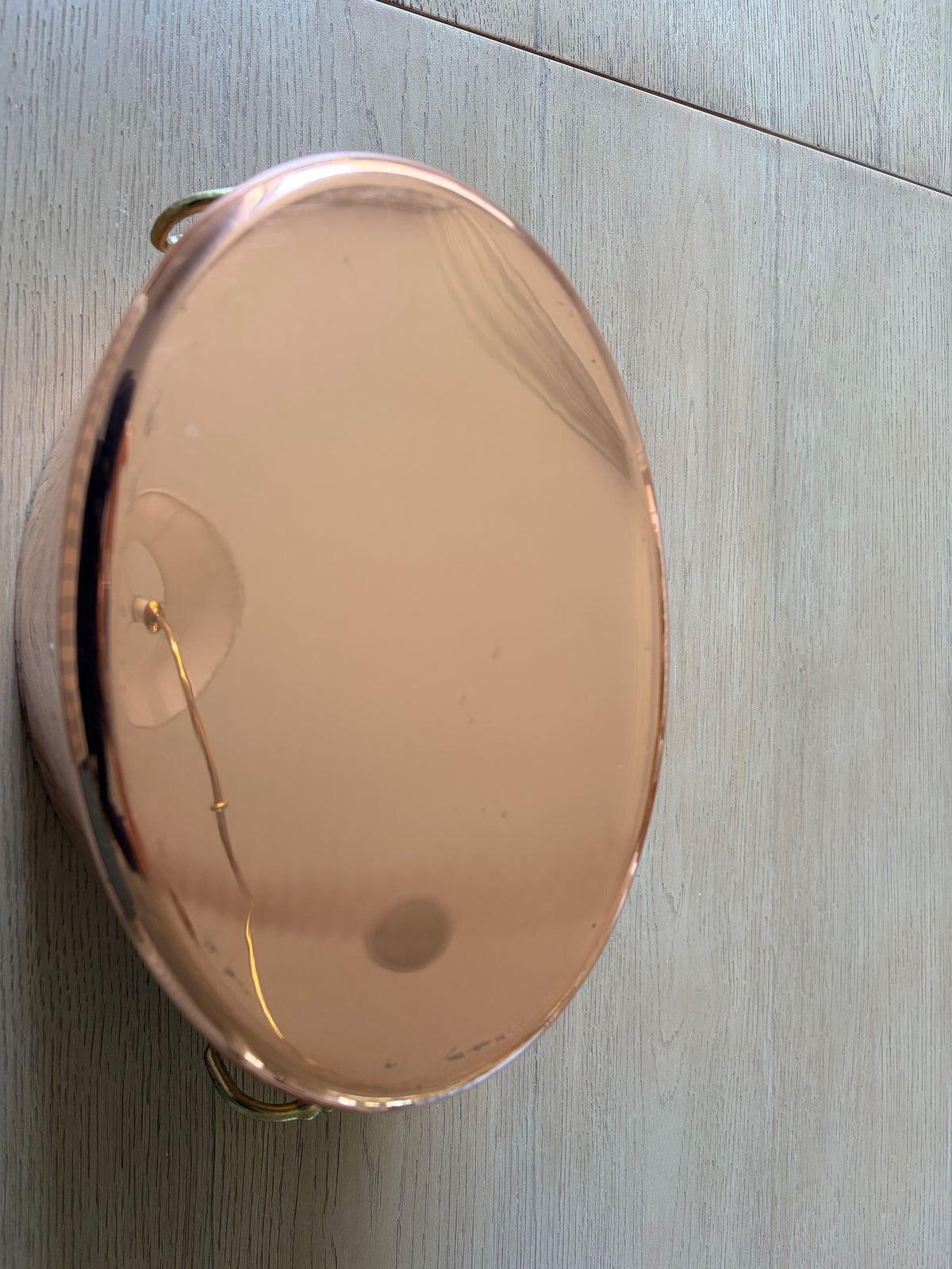 Tin-lined interior of the vintage copper champagne bucket