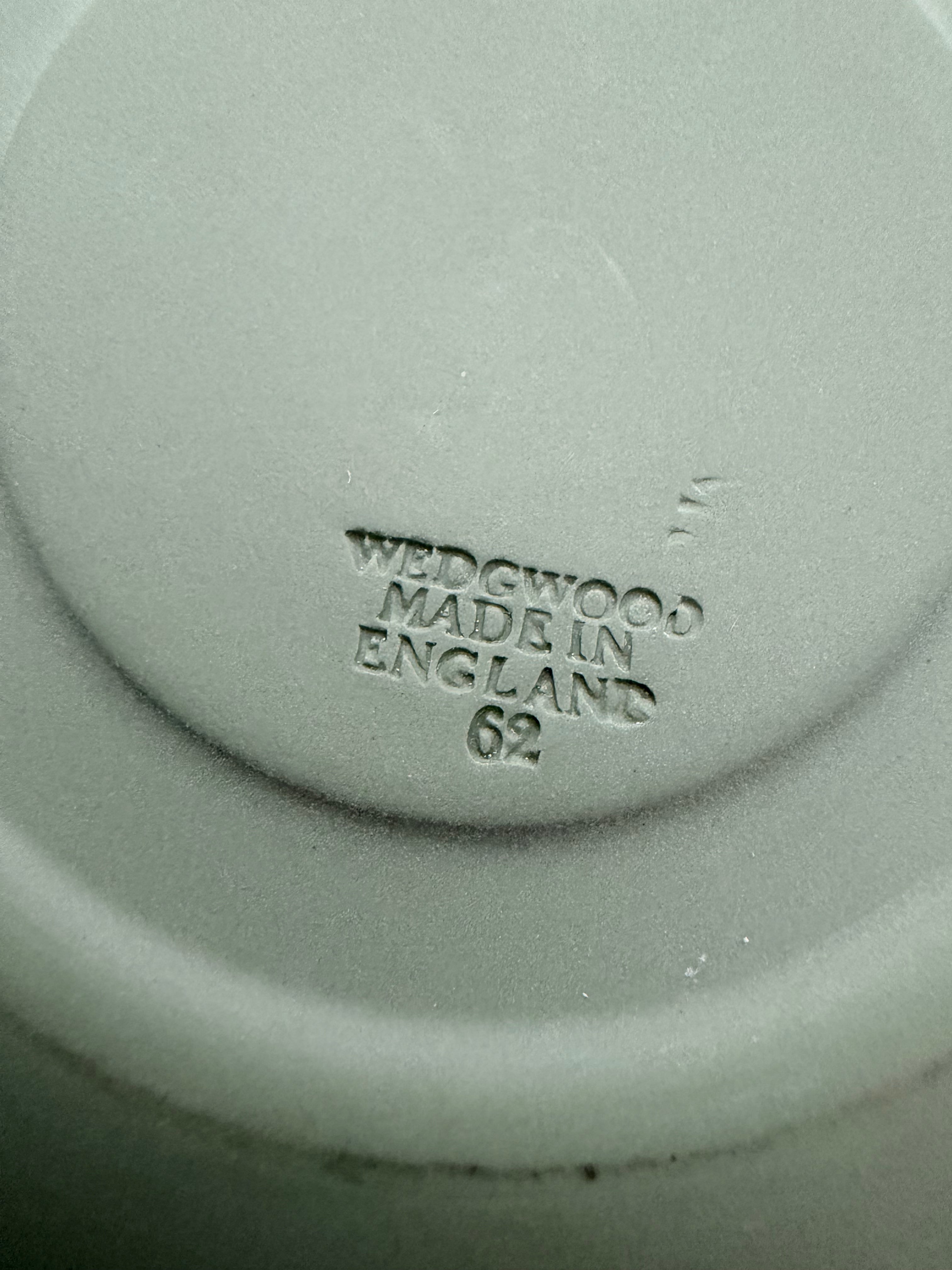 Close view of the cherub relief border on the Wedgwood jasperware saucer