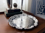 Towle silverplate tray, 12 inches, with a shaped Chippendale rim and engraved acanthus center