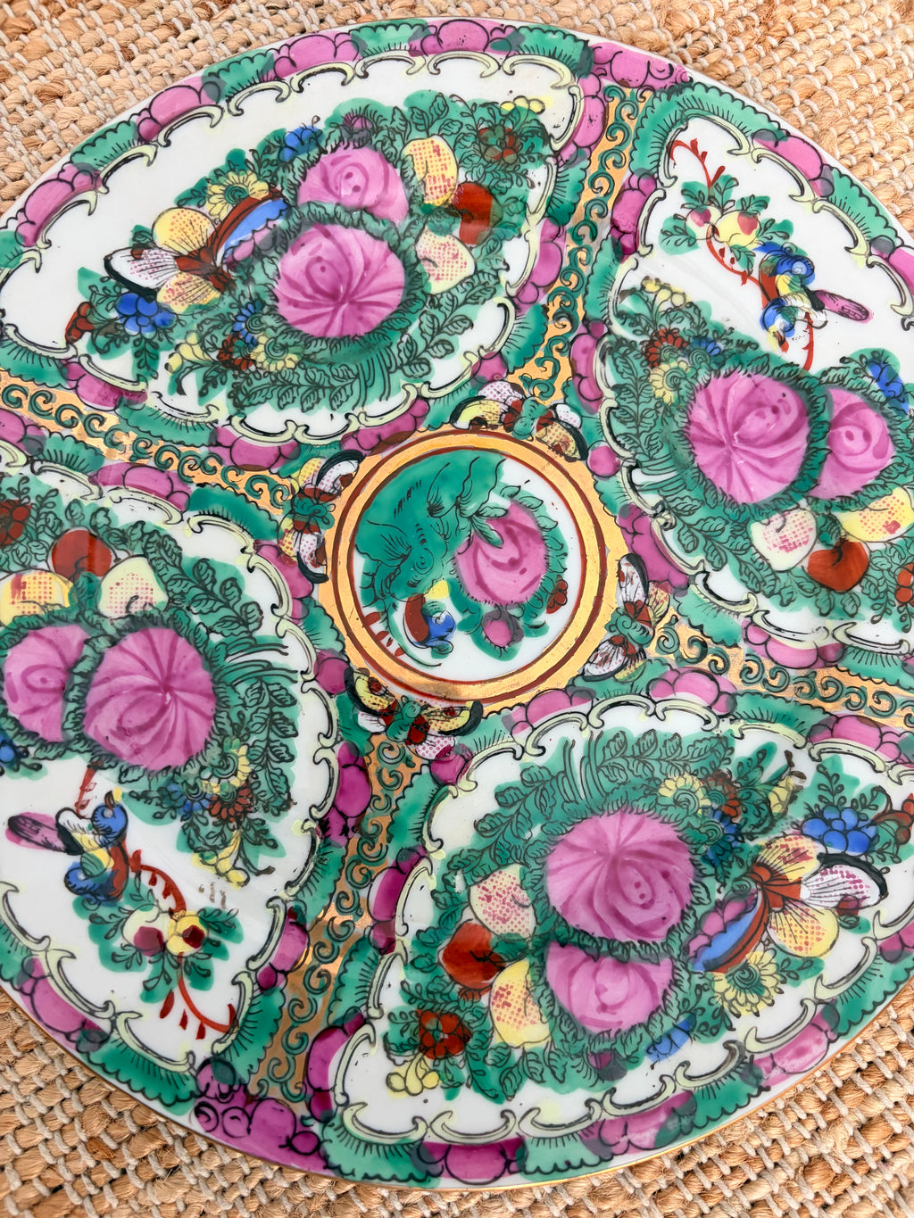 Detail of the 10 inch Rose Canton plate with pink cabbage roses, green foliage and gilded roundel