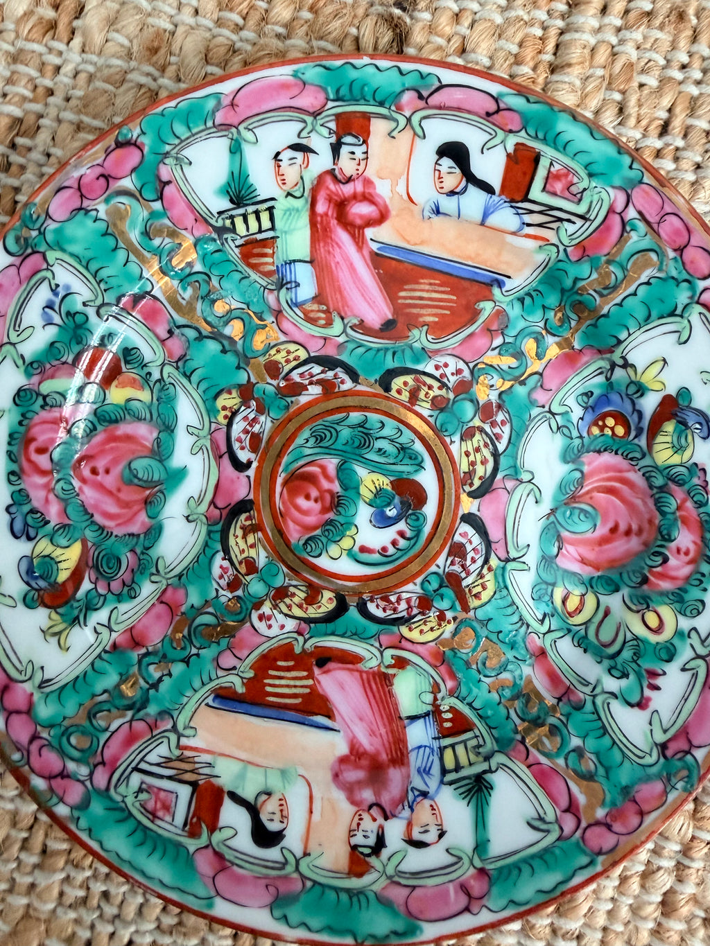 Detail of a 6 inch Rose Medallion plate showing hand painted court figures and floral panels